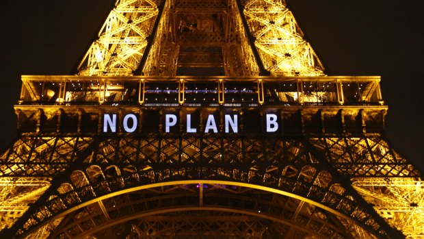 "NO PLAN B" is projected on the Eiffel Tower as part of the Climate Change Conference in Paris, 2015.