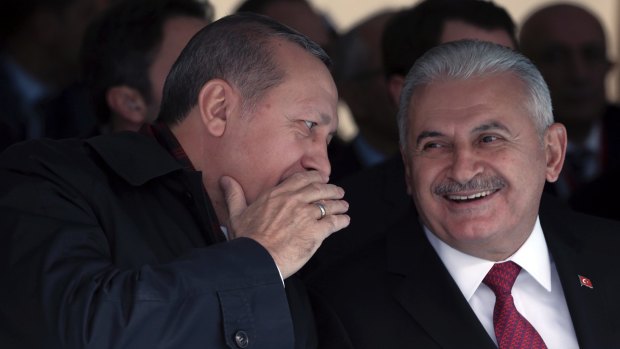 Prime Minister Binali Yildirim, right, with Recep Tayyip Erdogan.