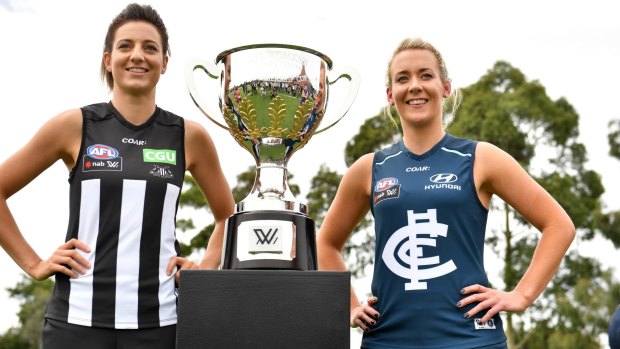 Collingwood's Steph Chiocci and Carlton's Lauren Arnell. 