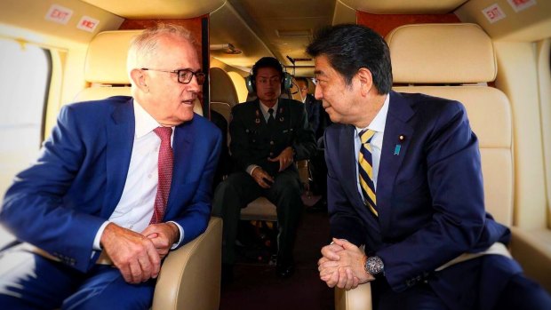 Prime Minister Malcolm Turnbull speaks with the Prime Minister of Japan, Shinzo Abe.