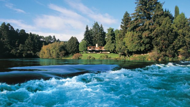Huka Lodge in Taupo, New Zealand, sits above the mighty Waikato River.