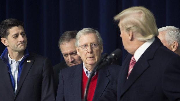 Senate Majority Leader Mitch McConnell, a Republican from Kentucky, centre, and House Speaker Paul Ryan, left, and US President Donald Trump. Republicans failed to get their bill up before the deadline.