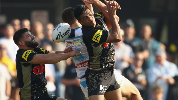 Wilting under pressure: Josh Mansour and Tyrone Peachey in action at Pepper Stadium on Sunday.