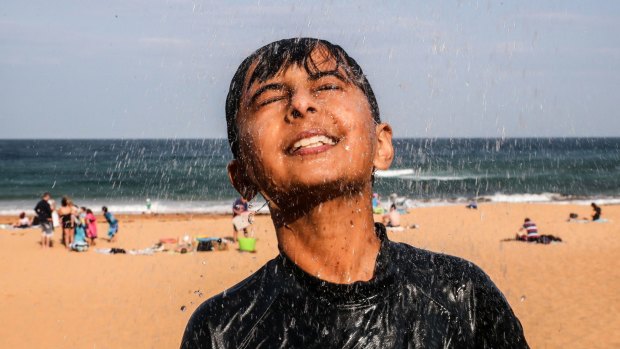 Ansh Sambyal escapes the heat at Bilgola Beach.