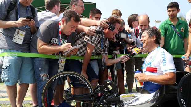 Alex Zanardi is interviewed after winning gold in the Men's Time Trial H5.