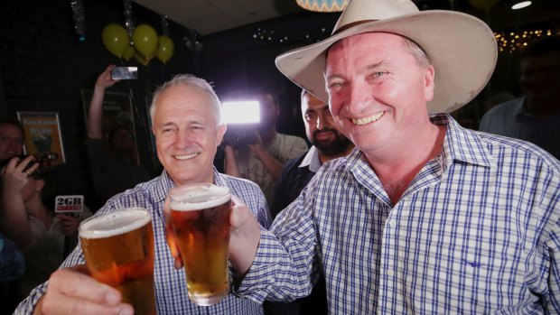 Malcolm Turnbull and Barnaby Joyce celebrate Joyce's win during the New England byelection in December.