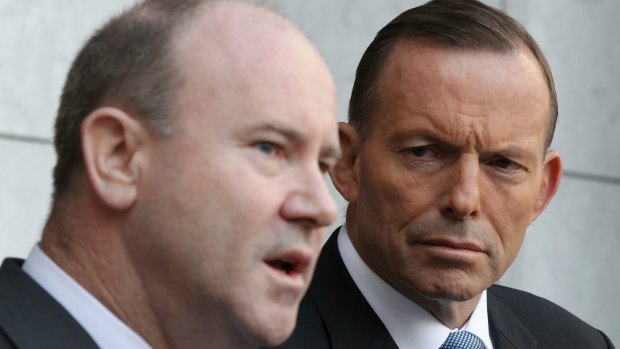 Greg Moriarty, Commonwealth Counter-Terrorism Co-ordinator and Prime Minister Tony Abbott during a press conference.
