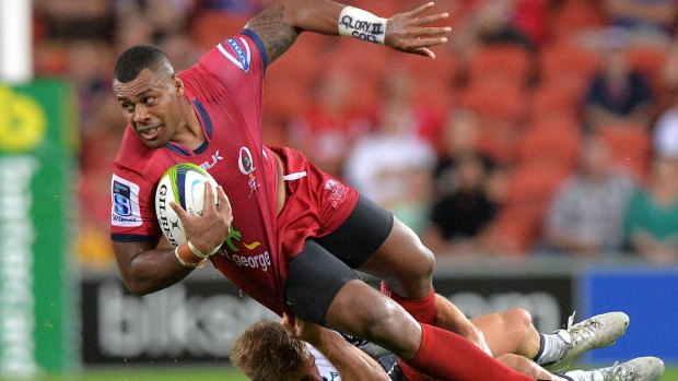 Samu Kerevi of the Reds is tackled during the round two Super Rugby match.