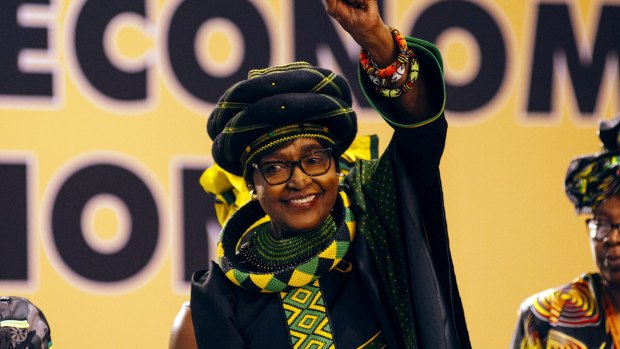 Winnie Madikizela-Mandela, wife of former president Nelson Mandela, greets the audience during the 54th national conference of the African National Congress party.