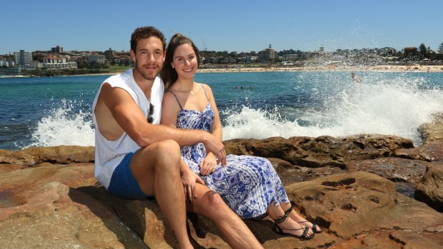 Love match: GWS player Shane Mumford with fiancee Eva Konta at Bondi. 