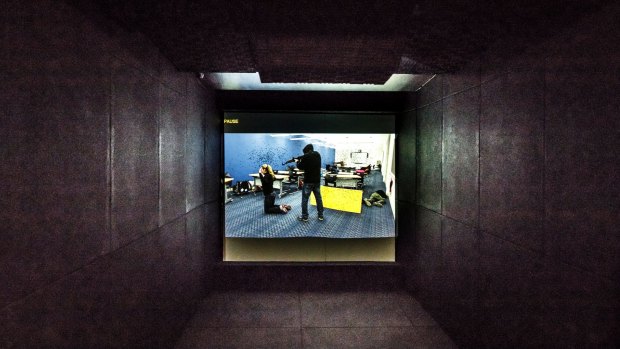 Inside an Australian Target Systems firing range housed in a shipping container. 