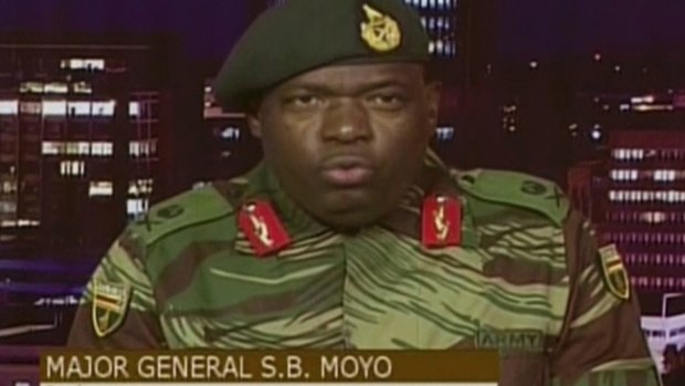 Major General S.B. Moyo, Spokesperson for the Zimbabwe Defense Forces addresses to the nation after taking over the state broadcaster in Harare, Zimbabwe on Wednesday. 
