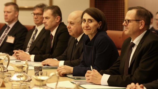 Federal Treasurer Joe Hockey met with state and territory treasurers including NSW Treasurer Gladys Berejiklian and Victorian Treasurer Tim Pallas.