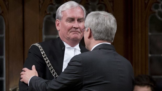 PM's praise: Canadian Prime Minister Stephen Harper speaks with Sergeant-at-Arms Kevin Vickers.
