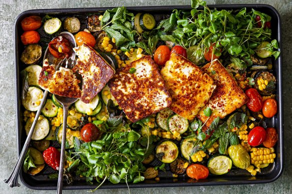 Summer on a tray: roasted seasonal veg topped with slabs of halloumi.