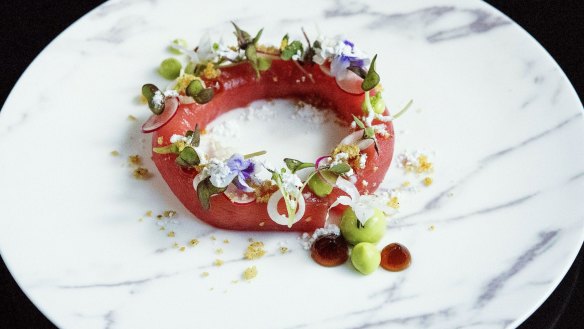 Sashimi of yellow fin tuna with jamon lberico cream avocado, baby radish, ponzu and pork crackling at Sepia restaurant 