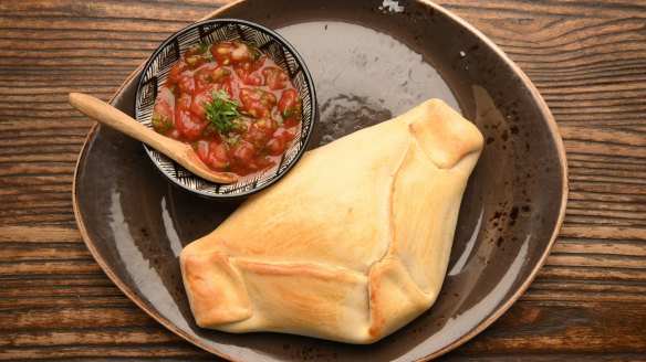 Empanada De Pino filled with beef mince, onion, olives and boiled egg.