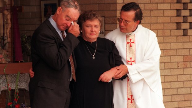 Alison Lewis' parents, Don and Pat, pictured following her funeral at St Patrick's Catholic Church in 1997.