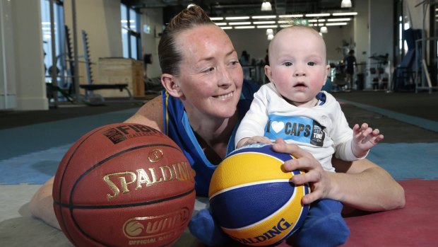 Canberra Capitals star Michelle Cosier with son Levi.