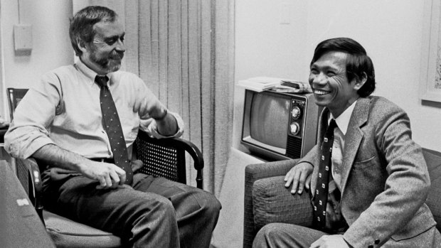 Sydney Schanberg, left, with Dith Pran at the New York Times office in New York in 1980. 