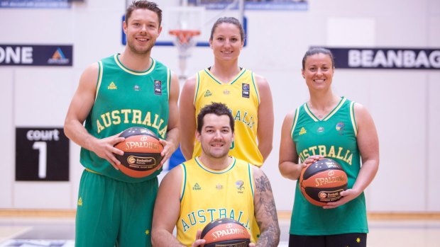 Matthew Dellavedova (Boomers), Kelsey Griffin (Opals), Leanna Del Toso (Gliders) and Josh Allison (Rollers) wear Australia's new basketball singlets. 