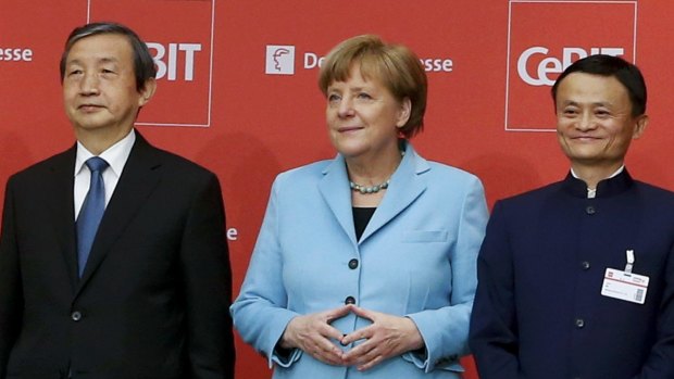 German Chancellor Angela Merkel, China's Vice Premier Ma Kai (L) and Alibaba founder and chairman Jack Ma at the official opening of the CeBIT Hanover 2015.