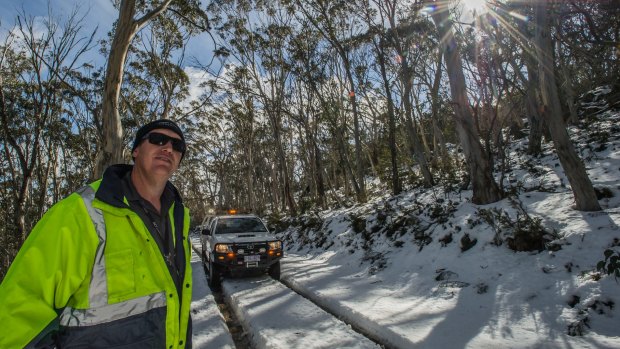 Transport Canberra and City Services Project Officer Adam Melville looks after icy or snow affected roads in the Namadgi National Park area (near the Mount Franklin chalet site)