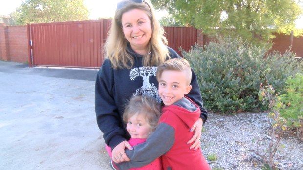 Amanda Lawes with her daughter, Alison, 4, and her son. 