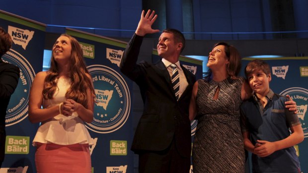Confident: Mike Baird and family take the stage. 