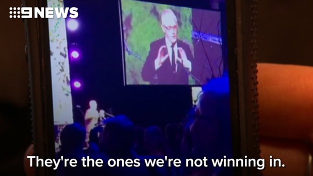 Malcolm Turnbull mimics the US President at the Midwinter Ball in Canberra.