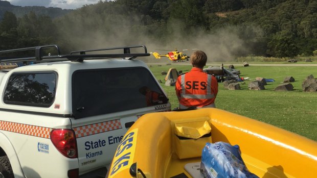 Rescue services search for a man who went missing after wading into a river in the Kangaroo Valley.