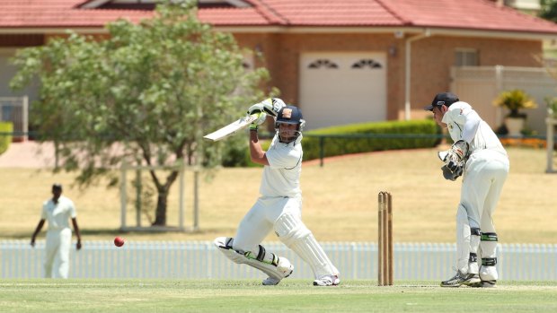 Best of the West: Phillip Hughes on his way to another century for Western Suburbs against Blacktown in 2011.