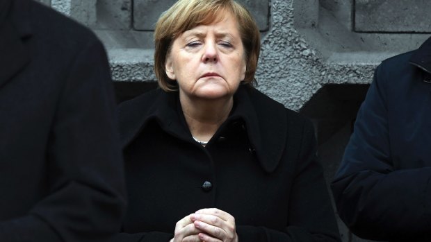 German Chancellor Angela Merkel at Tuesday's opening of a memorial site to honour the victims of the Christmas market terrorist attack on the Breitscheid square a year ago