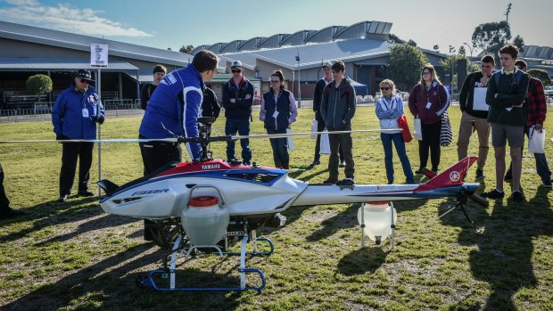 Students learn about the Fazer unmanned helicopter at AgVision in Homebush.
