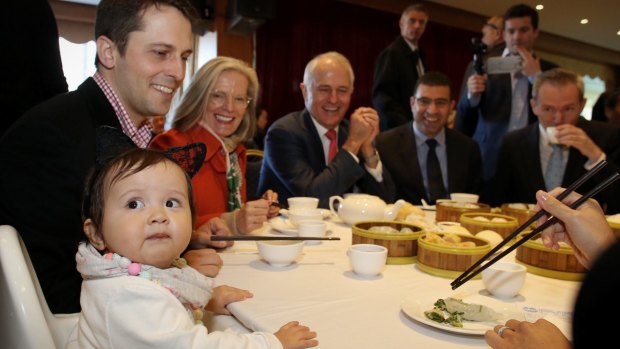 Prime Minister Malcolm Turnbull and Lucy with their granddaughter Isla and son Alex.