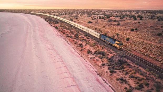 The Indian Pacific passing Lake Hart, a dry salt pan north of Woomera in South Australia.