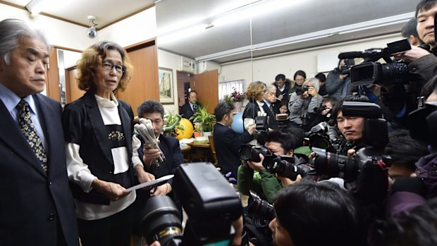 Yukio and Junko Ishido, the parents of the murdered Islamic State hostage Kenji Goto, speak to reporters in Tokyo on Sunday.