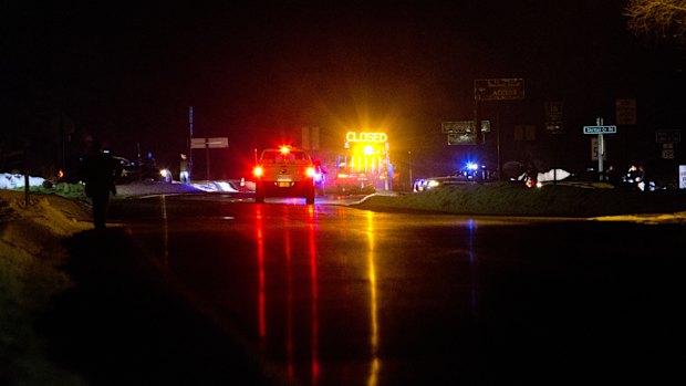 Highway 395 is blocked at Seneca between John Day and Burns, Oregon by state police officers.