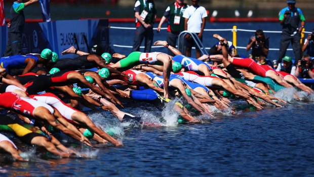 The start of the men's triathlon. Several competitors were removed from the race before the end of the 1500m swim leg.