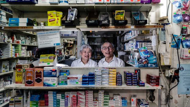 Nang and Jin Wu, who have owned and worked at the same pharmacy on George Street for 40 years. 