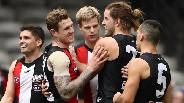Flawless performance? Nick Riewoldt is congratulated by teammates.