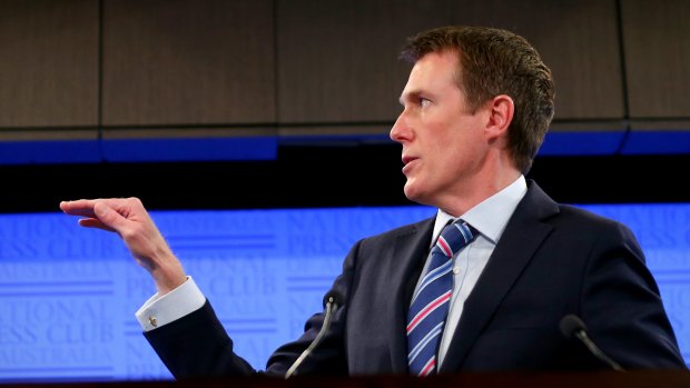 Social Services Minister Christian Porter addresses the National Press Club in Canberra.
