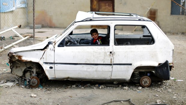 Going nowhere: a Syrian refugee boy in the al-Marj camp.