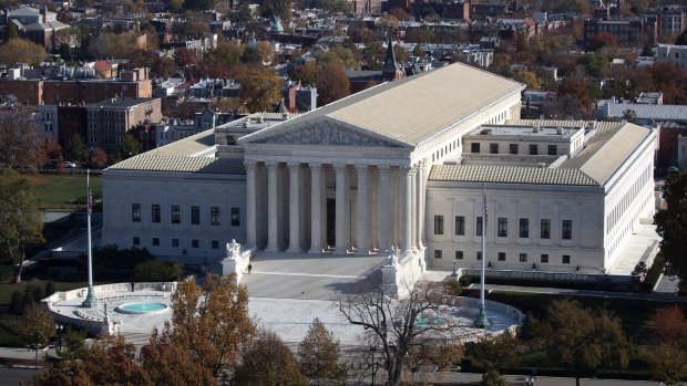 The US Supreme Court is trying to  disentangle the roles of race and partisanship when drawing congressional district maps.  