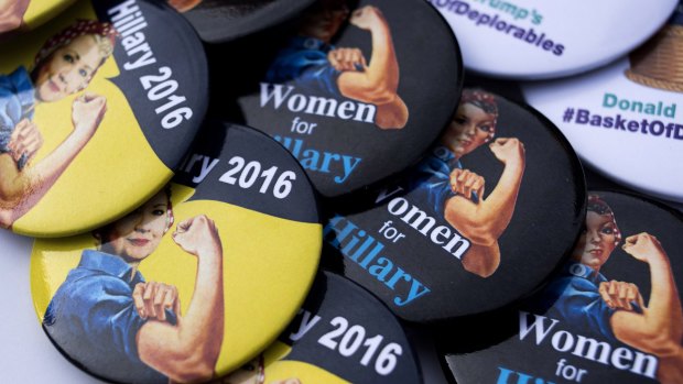 Campaign buttons are displayed for sale before the start of an event with Hillary Clinton inOhio.