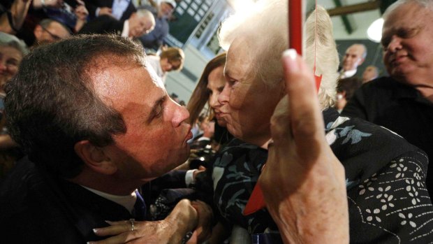 Chris Christie gets a kiss from a supporter after he formally announced his campaign for the 2016 Republican presidential nomination during a kickoff rally.