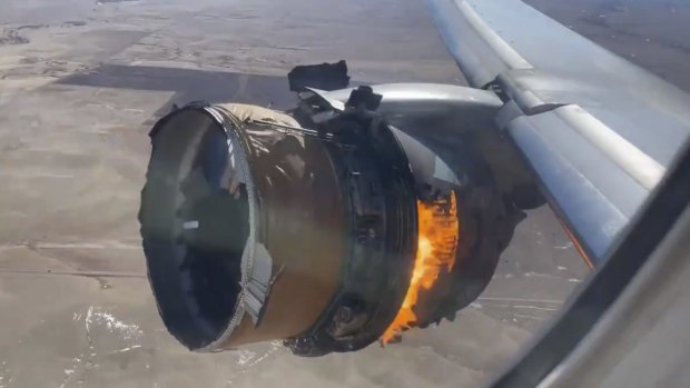The engine of United Airlines Flight 328 is on fire after after experiencing a 'right-engine failure' shortly after takeoff from Denver International Airport on February  20.