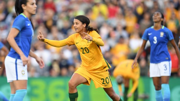 The winner: Sam Kerr reacts after scoring with a glancing header.