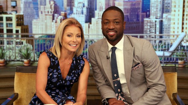 TV host Kelly Ripa and NBA basketball player Dwyane Wade during the production of "Live Kelly" in New York in July.