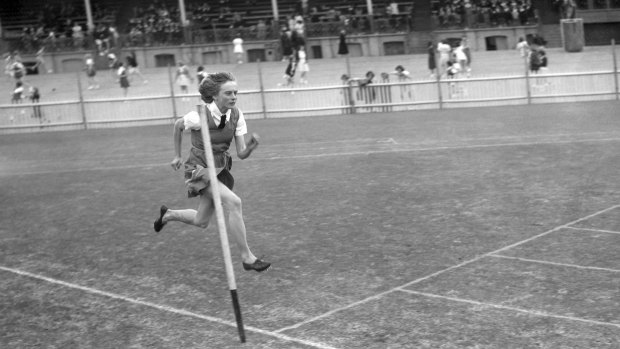 Betty Cuthbert from Macarthur Girls High School tries out the track at a schools athletics carnival in Sydney, 1952.